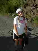Angela Cranney standing with her bike.