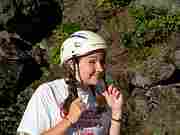 Angela Cranney puting on her helmet.