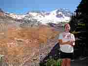 Angela Cranney posing at view point of Emerald Ridge.
