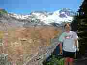 Angela Cranney posing at view point of Emerald Ridge.