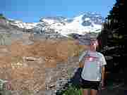 Angela Cranney posing at view point of Emerald Ridge.