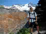 Derek Rowley posing at view point of Emerald Ridge.